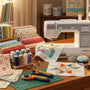 Colorful quilting fabrics and tools in a cozy quilting workspace