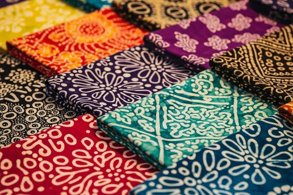 Vibrant batik quilting fabrics with unique hand-dyed patterns and rich colors