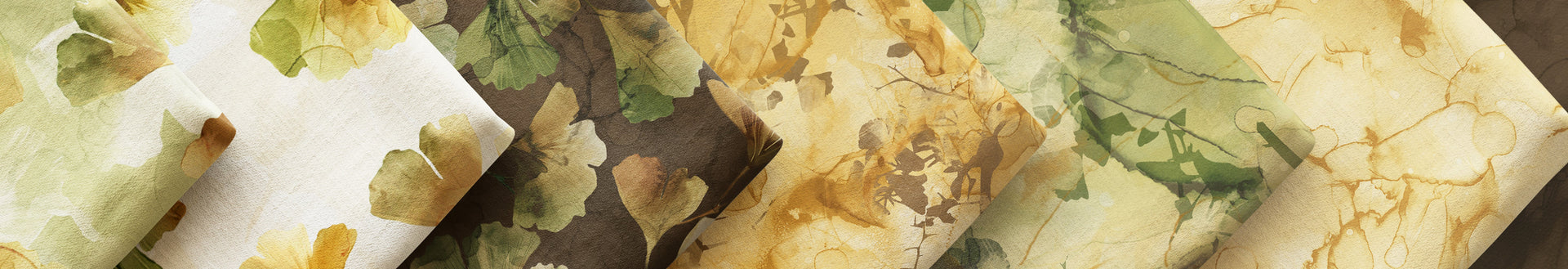 Ginko Fabrics layered and folded on a wide background