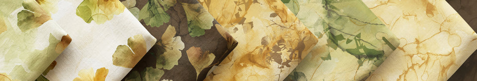 Ginko Fabrics layered and folded on a wide background